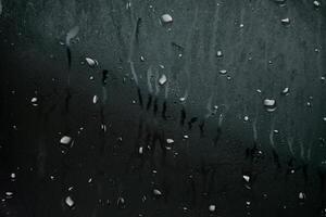 textura de superposición de lluvia negra oscura efecto de niebla salpicaduras abstractas de gota de lluvia sobre negro foto