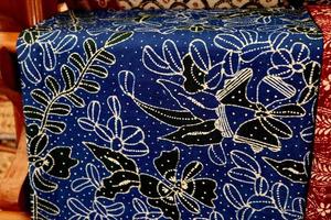 Close look of popular fabrics in Indonesia called Batik, this is made of natural colors photo