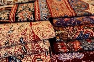 Close look of popular fabrics in Indonesia called Batik, this is made of natural colors photo