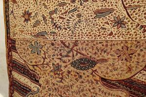 Close look of popular fabrics in Indonesia called Batik, this is made of natural colors photo