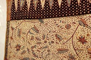 Close look of popular fabrics in Indonesia called Batik, this is made of natural colors photo