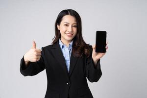 Asian businesswoman portrait, isolated on white background photo