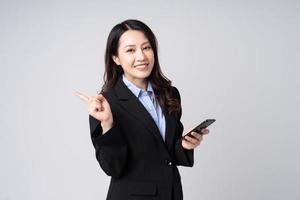 Asian businesswoman portrait, isolated on white background photo