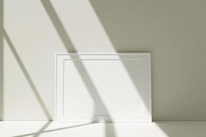 maqueta de marcos de fotos blancos horizontales en el piso apoyado contra la pared de la habitación con sombra