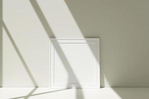 maqueta de marcos de fotos blancos cuadrados en el piso apoyado contra la pared de la habitación con sombra