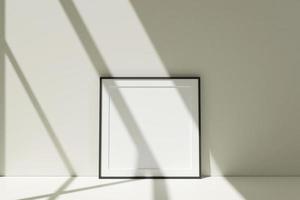 maqueta de marcos de fotos negros cuadrados en el piso apoyado contra la pared de la habitación con sombra