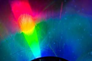 rainbow blur multicolored sparkle bright abstract colorful on black photo