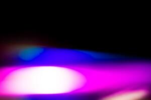 blue and purple blur multicolored sparkle bright abstract colorful on black photo