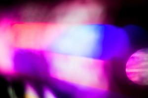 purple and blue blur multicolored sparkle bright abstract colorful on black photo