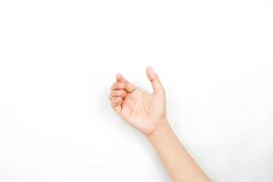 una mano actúa como si estuviera sosteniendo algo. una colección de gestos con las manos aislados en un fondo blanco.