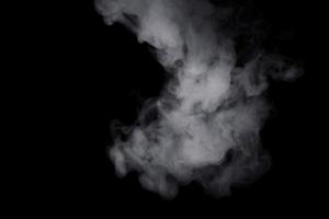 white smoke on black background for overlay effect. a realistic smoke effect for creating an intense nuance in a photo