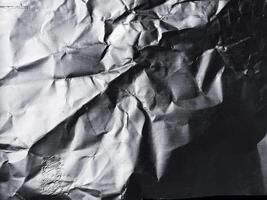 la superficie de la textura de papel de aluminio para materiales de fondo y diseño. colección de textura arrugada de lámina de plata. Fondo de patrón arrugado abstracto foto