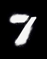the 7 is written using a sprayed ink in a white color. the number of illustrations on a black background to create a poster, street design, etc. photo