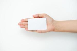 an empty white space is fully on the top of the right hand. a mockup that is suitable for business or identity mockup use. photo