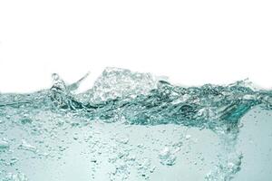 the wavy surface of water from the side view. the side view of the water surface isolated on white. abstract liquid nature texture. photo