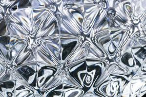 primer plano de textura de cristal que muestra la impresión brillante y lujosa. Acercamiento de un adorno de diamantes para diseño creativo. foto