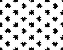 Seamless pattern with the image of various puzzle pieces in the sketch style. Black and white print. Design for decor, paper, textiles. vector