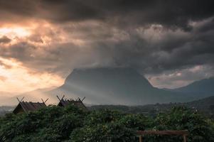 View of Doi Luang Chiang Dao mountain with sunbeam shine and clouds covered in the evening
