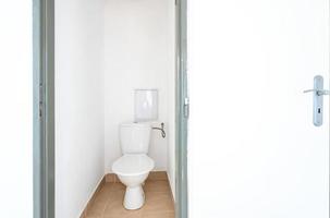 toilet in the apartment in a panel house photo