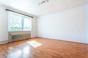 empty room with window and floor in a panel house photo