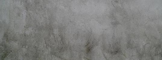 Gray cement plaster. Wall texture for background. Brush scratches on the wall photo