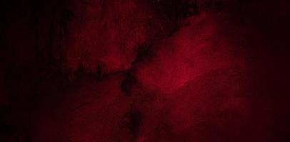 Dark maroon concrete wall for the background. dark red slum cement photo