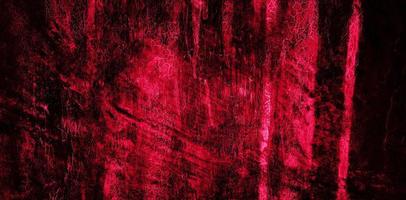 Dark maroon concrete wall for the background. dark red slum cement photo