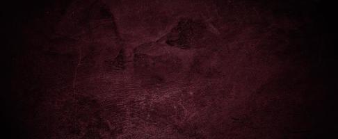 Scary dark red walls, slightly light dark concrete cement texture for background photo