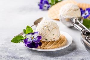 Vanilla ice cream with edible flowers