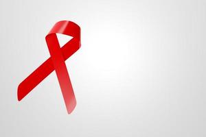 Bandera del cartel de la cinta de la conciencia del día mundial del sida, símbolo de la cinta roja sobre fondo blanco con espacio de copia. concepto sanitario y médico. Ilustración de render 3d. foto