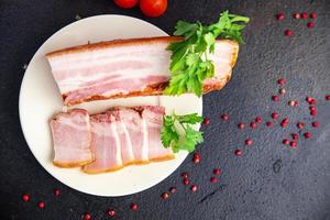 fresh bacon pork piece fat with meat meal photo