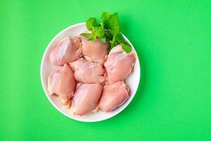 raw chicken skinless meat thigh boneless pulp photo