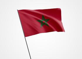 bandera de Marruecos ondeando alto en el fondo aislado. 18 de noviembre día de la independencia de marruecos. colección de la bandera nacional mundial colección de la bandera nacional mundial foto