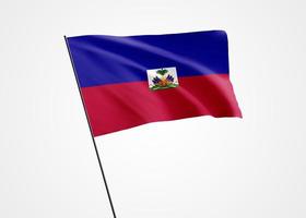 Haití bandera ondeando alto en el fondo aislado. 01 de enero día de la independencia de haití. colección de la bandera nacional mundial colección de la bandera nacional mundial foto