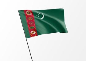 bandera de turkmenistán ondeando alto en el fondo aislado día de la independencia de turkmenistán. Ilustración 3d colección de la bandera nacional mundial foto