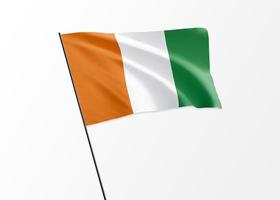 Ivory Coast flag flying high in the isolated background Ivory Coast independence day. 3D illustration world flag collection photo