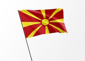 Macedonian flag flying high in the isolated background Macedonian independence day. World national flag collection photo