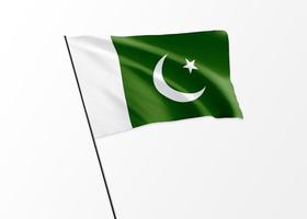 bandera de pakistán ondeando alto en el fondo aislado día de la independencia de pakistán. Ilustración 3d colección de la bandera nacional mundial foto