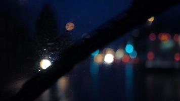 Slow Motion Rainy Night view of the Wipers Motion From Inside a Car video