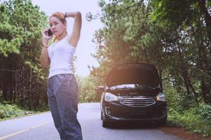 Women The car was broken on the highway. countryside. Women broken car photo