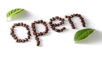 coffee beans on white background with open Text made of coffee beans photo