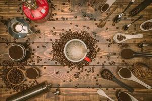 background concept Coffee cup and coffee grinder with other accessories. espresso and beans. Top view with copy space for your text. photo