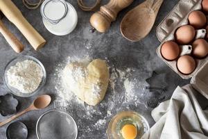 top view dough counter with flour eggs photo