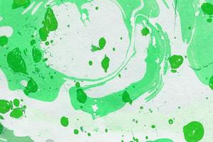 Fondo de tinta abstracta.Texturas de papel de tinta de mármol verde de invierno sobre fondo blanco de acuarela.Papel tapiz para diseño web y de juegos. foto