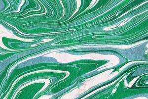 Fondo de tinta abstracta.Texturas de papel de tinta de mármol verde de invierno sobre fondo blanco de acuarela.Papel tapiz para diseño web y de juegos. foto