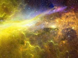 Infinite beautiful cosmos dark blue and yellow background with nebula, cluster of stars in outer space. Beauty of endless Universe filled stars.Cosmic art, science fiction wallpaper photo