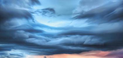 Beautiful sky blue evening beauty and Clouds at sunset , dawn, the rays of the sun break through the clouds. Natural photo