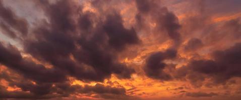 Beautiful orange sky evening beauty and Clouds at sunset , dawn, the rays of the sun break through the clouds. Natural