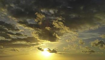 Beautiful yellow sky evening beauty and Clouds at sunset , dawn, the rays of the sun break through the clouds. Natural photo