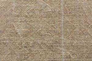 Background and texture of weave of eco-friendly old rough hemp photo